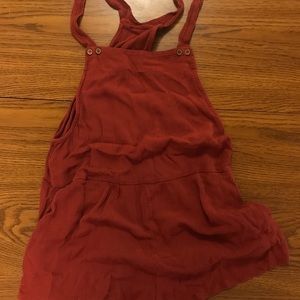 Red overall romper